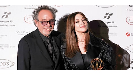 Globo d’oro con star: Tim Burton con Monica Bellucci, Sting con Trudie Styler